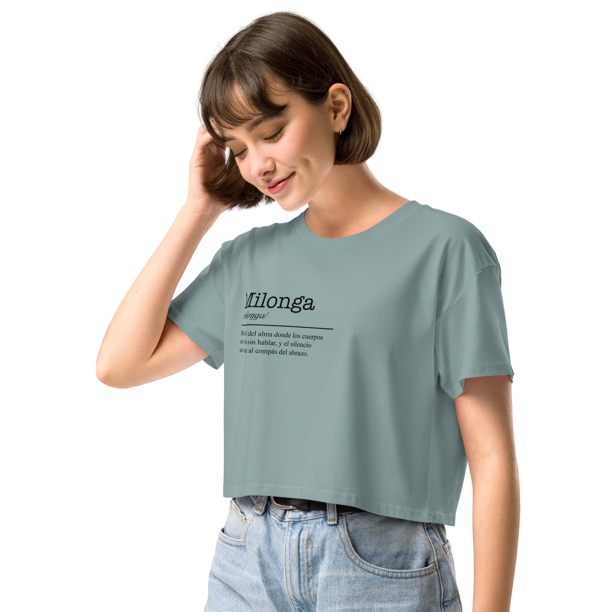 Woman wearing a light blue t-shirt with text on a white background