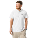 Man wearing a white polo shirt with a logo on a white background