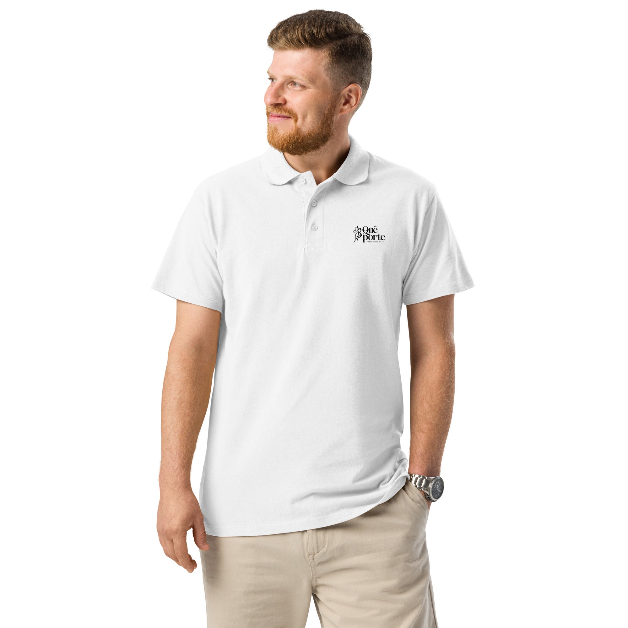 Man wearing a white polo shirt with a logo on a white background