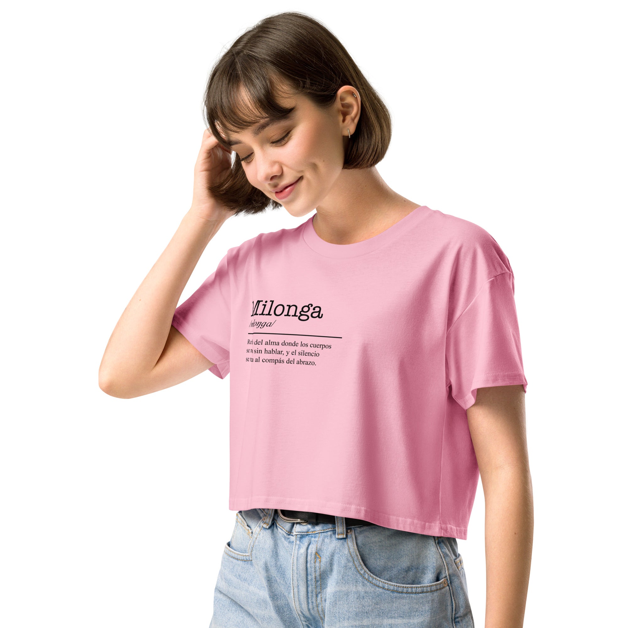 Woman wearing a pink t-shirt with text on a white background