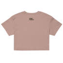 Pink crop top with a brand logo on the back against a white background