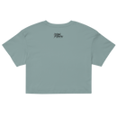 Light blue crop top with a brand logo on the back against a white background