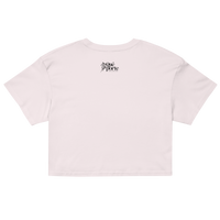 Pink crop top with a brand logo on the back against a white background