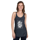 Woman wearing a navy tank top with white text on a white background