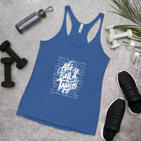 Blue tank top with white text on a gray surface with fitness items around